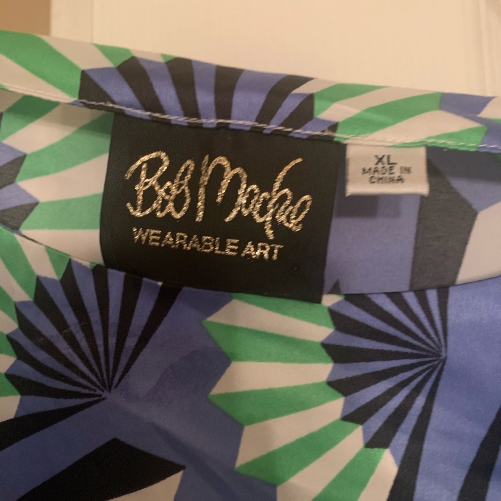 Nice Bob Mackie shirt!